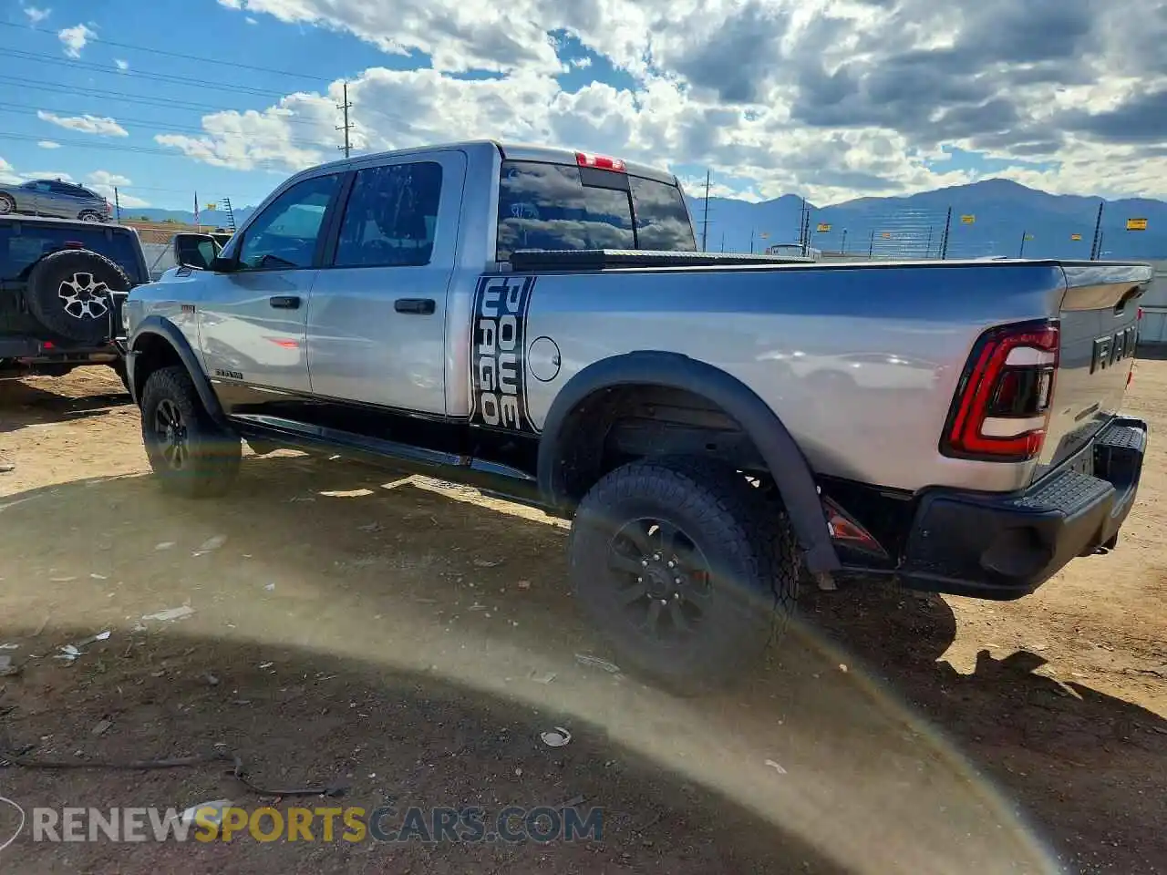 2 Photograph of a damaged car 3C6TR5EJ0MG681965 RAM 2500 2021