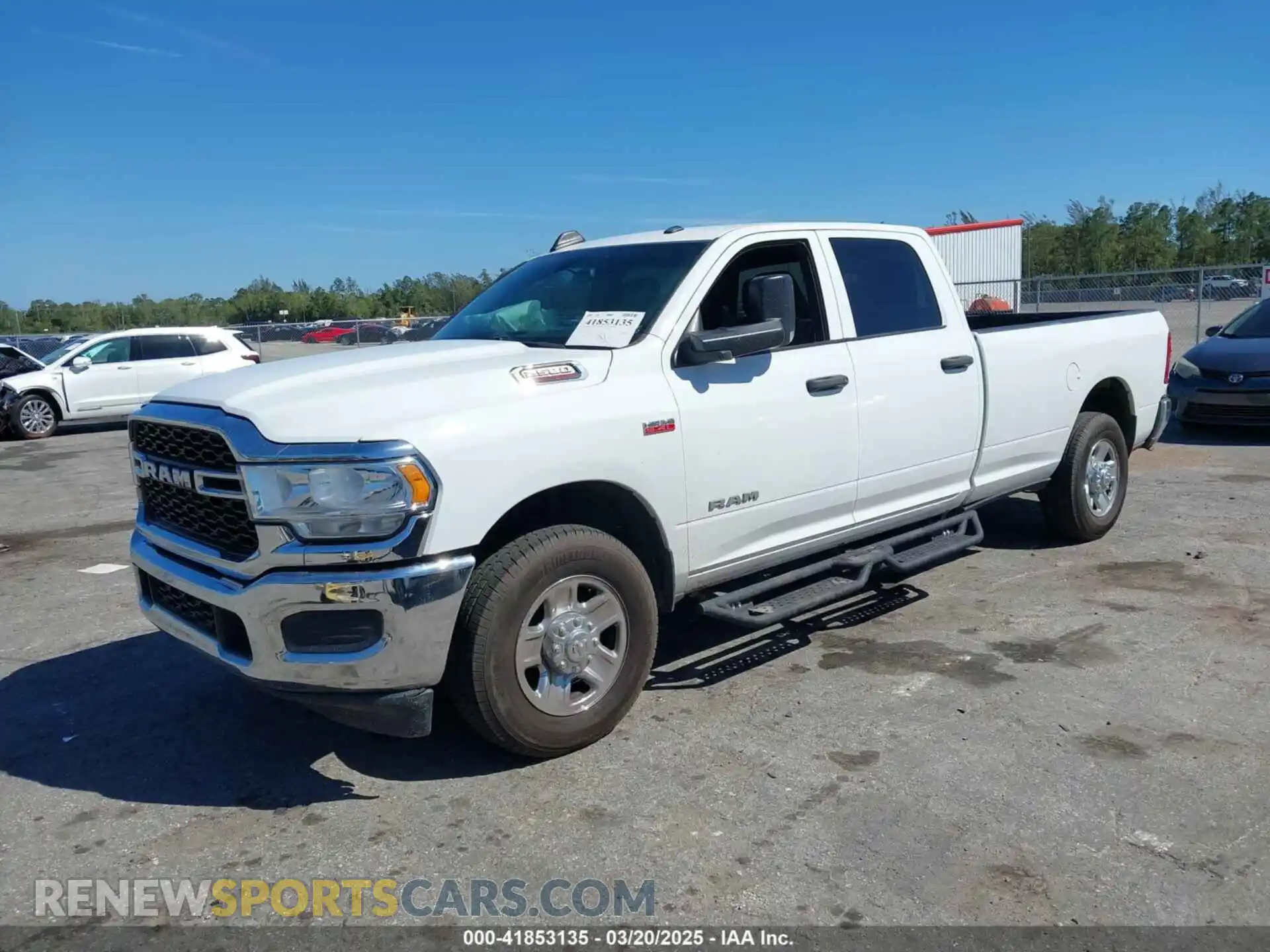 2 Photograph of a damaged car 3C6UR4HJ3MG501081 RAM 2500 2021