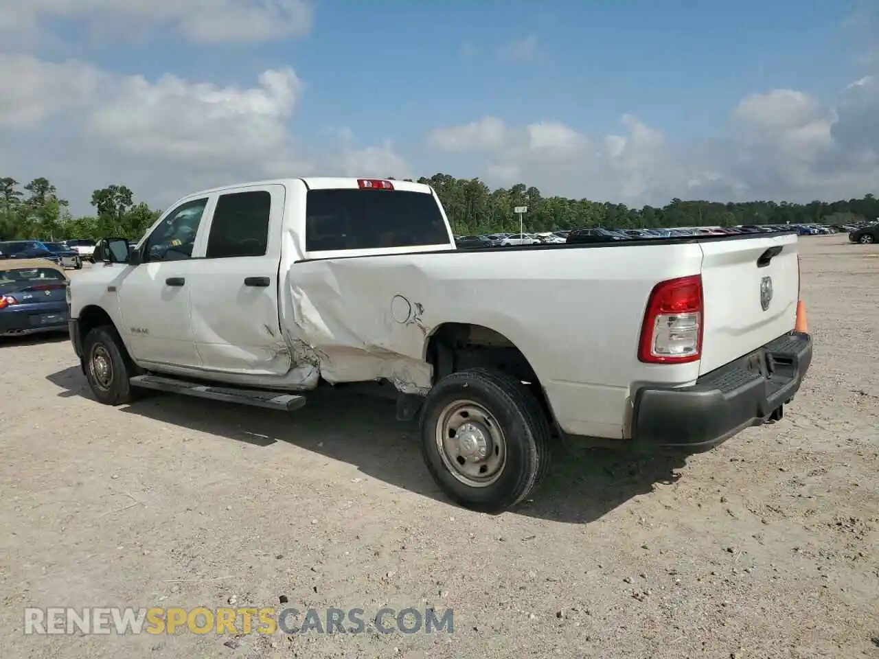 2 Photograph of a damaged car 3C6UR4HJ6MG501060 RAM 2500 2021