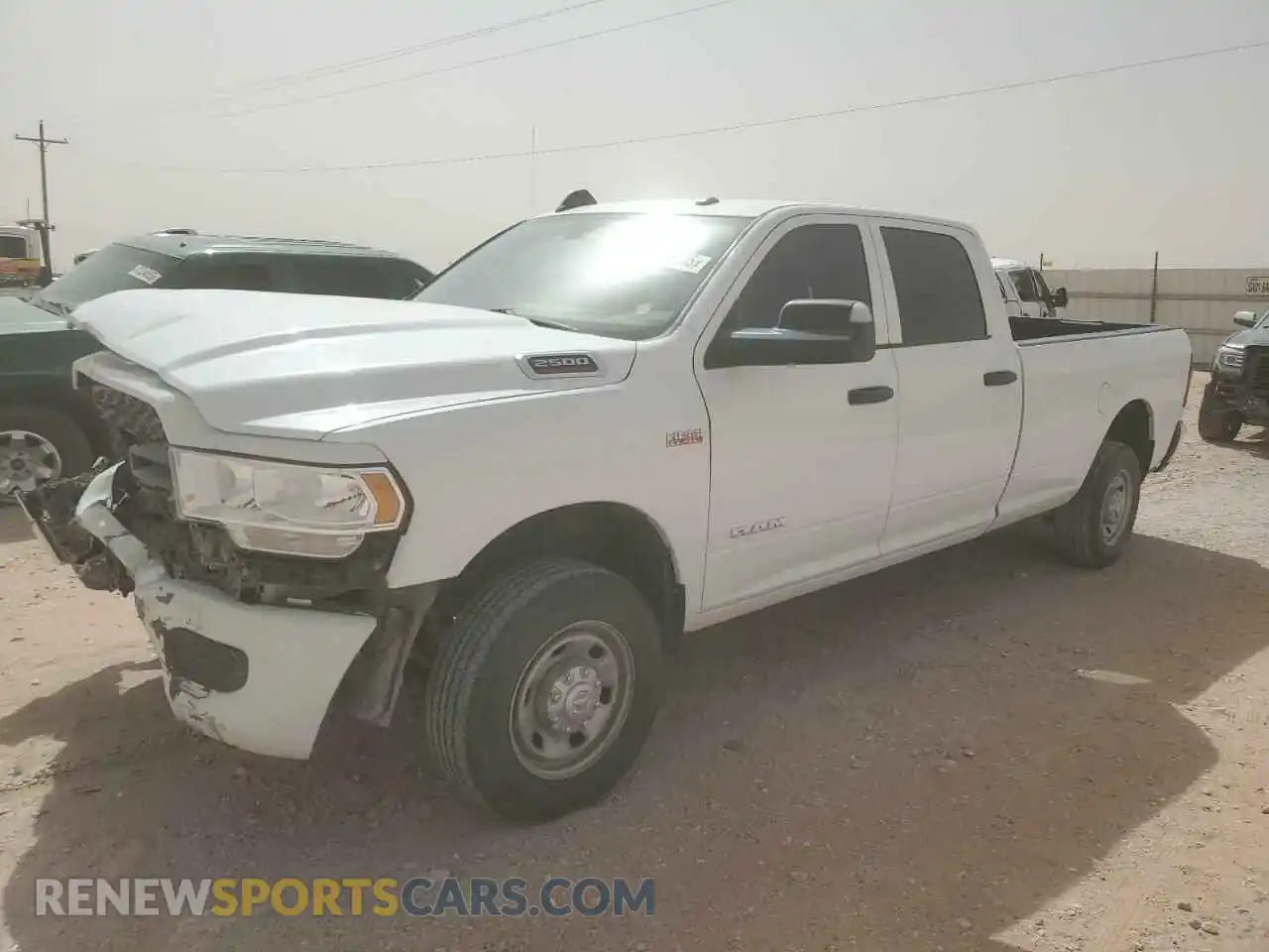 1 Photograph of a damaged car 3C6UR4HJ9MG674085 RAM 2500 2021