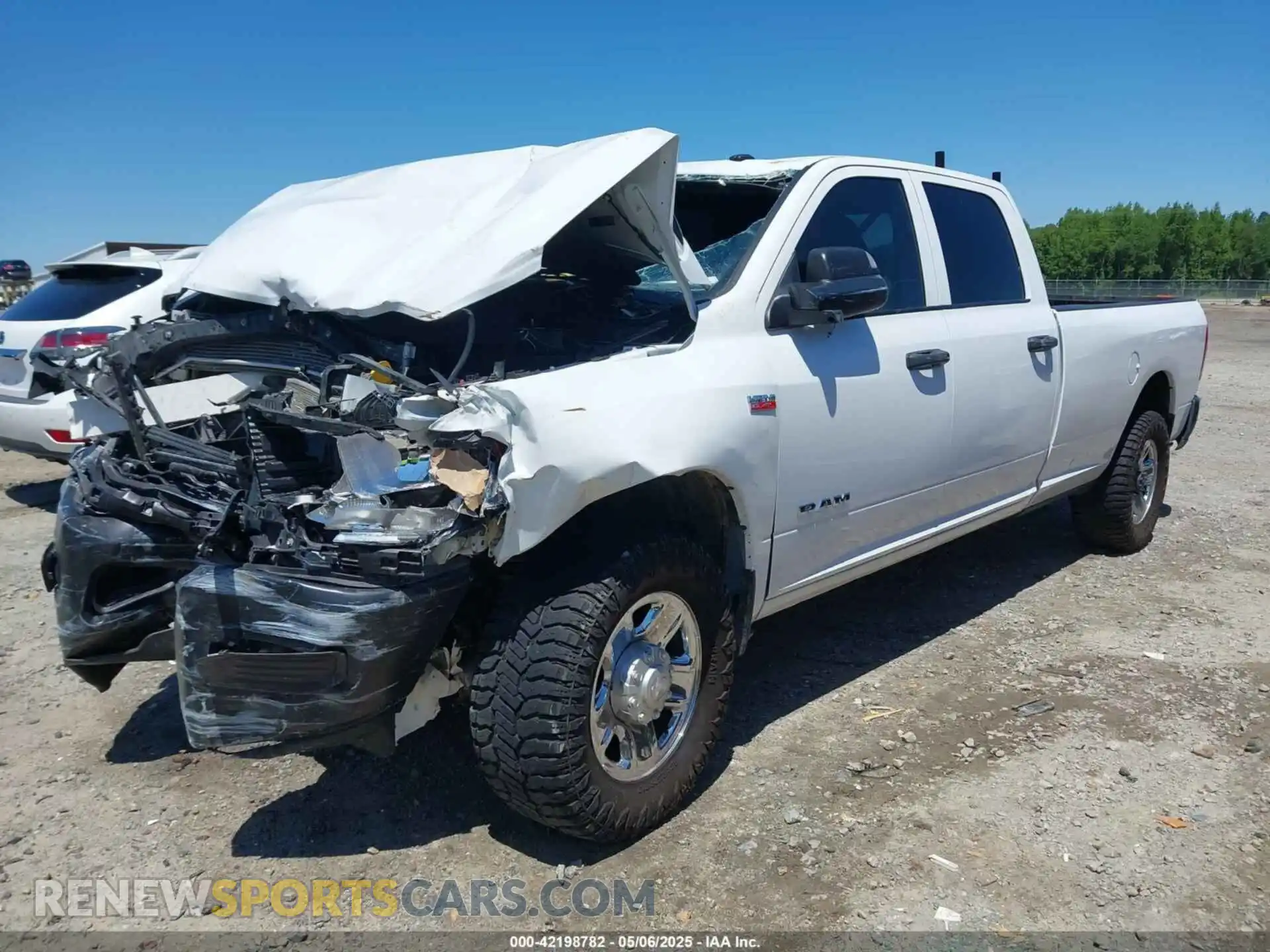 2 Photograph of a damaged car 3C6UR4HJXMG674094 RAM 2500 2021