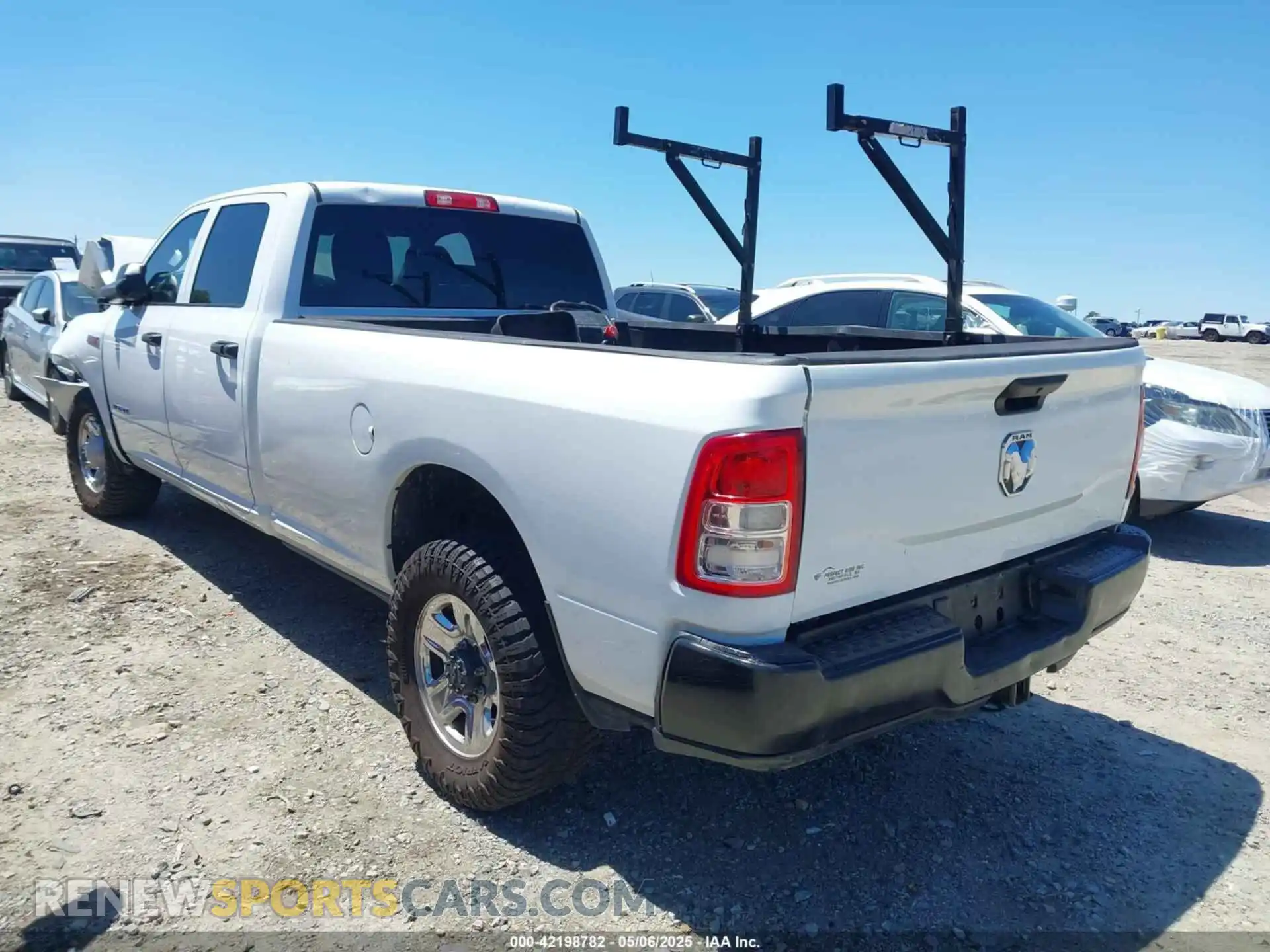 3 Photograph of a damaged car 3C6UR4HJXMG674094 RAM 2500 2021