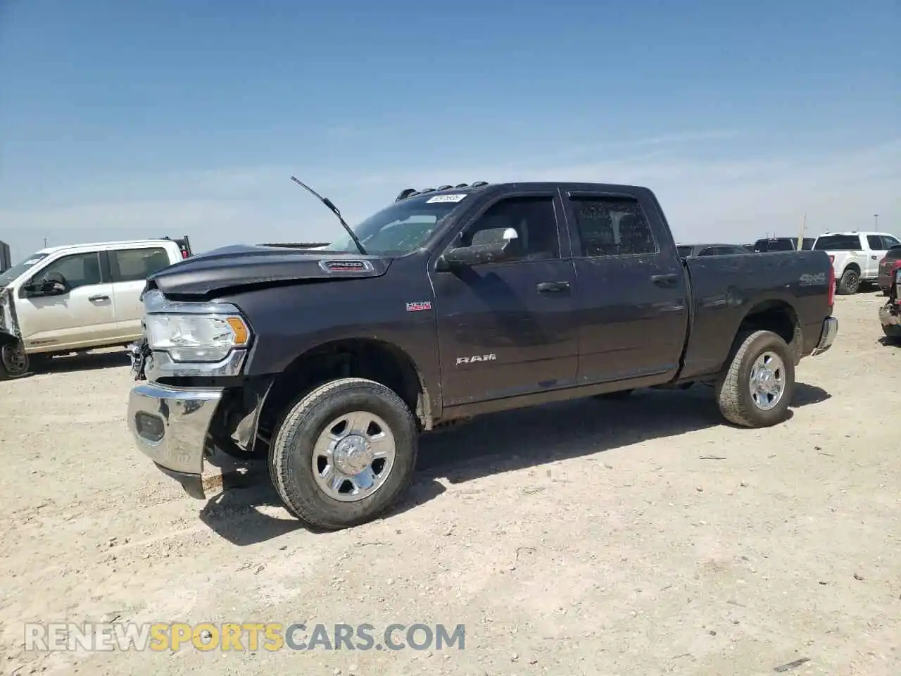 1 Photograph of a damaged car 3C6UR5CJ0MG561557 RAM 2500 2021