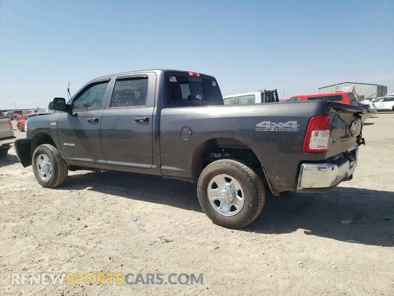 2 Photograph of a damaged car 3C6UR5CJ0MG561557 RAM 2500 2021