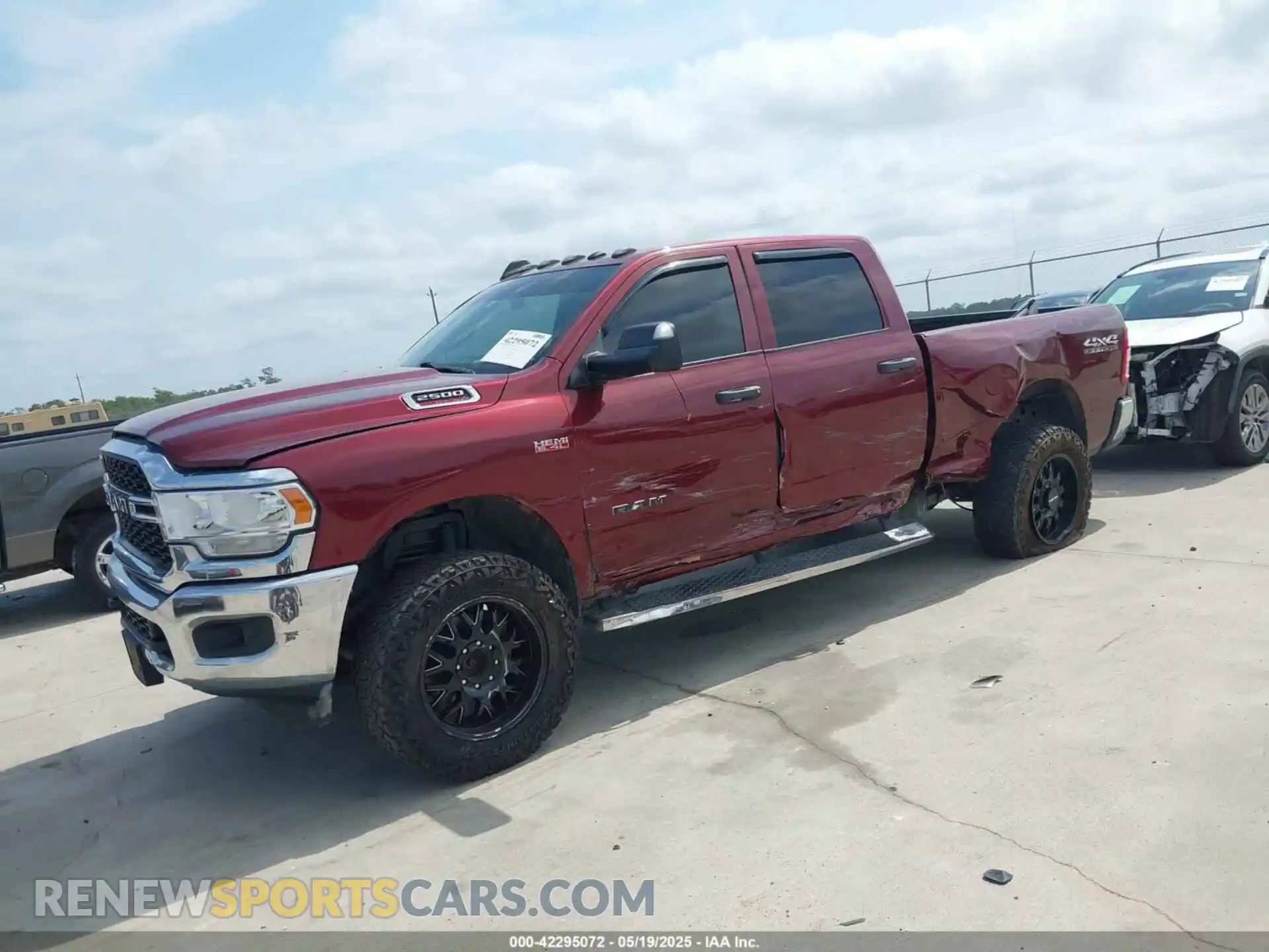 2 Photograph of a damaged car 3C6UR5CJ2MG502977 RAM 2500 2021
