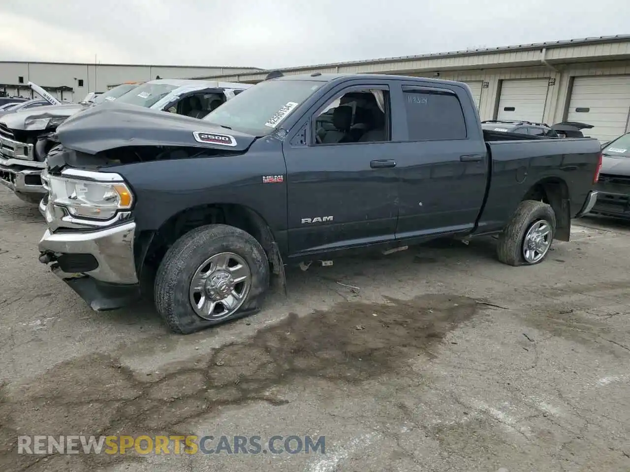 1 Photograph of a damaged car 3C6UR5CJ2MG561219 RAM 2500 2021