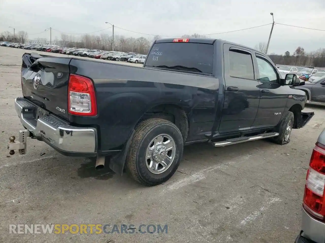 3 Photograph of a damaged car 3C6UR5CJ2MG561219 RAM 2500 2021