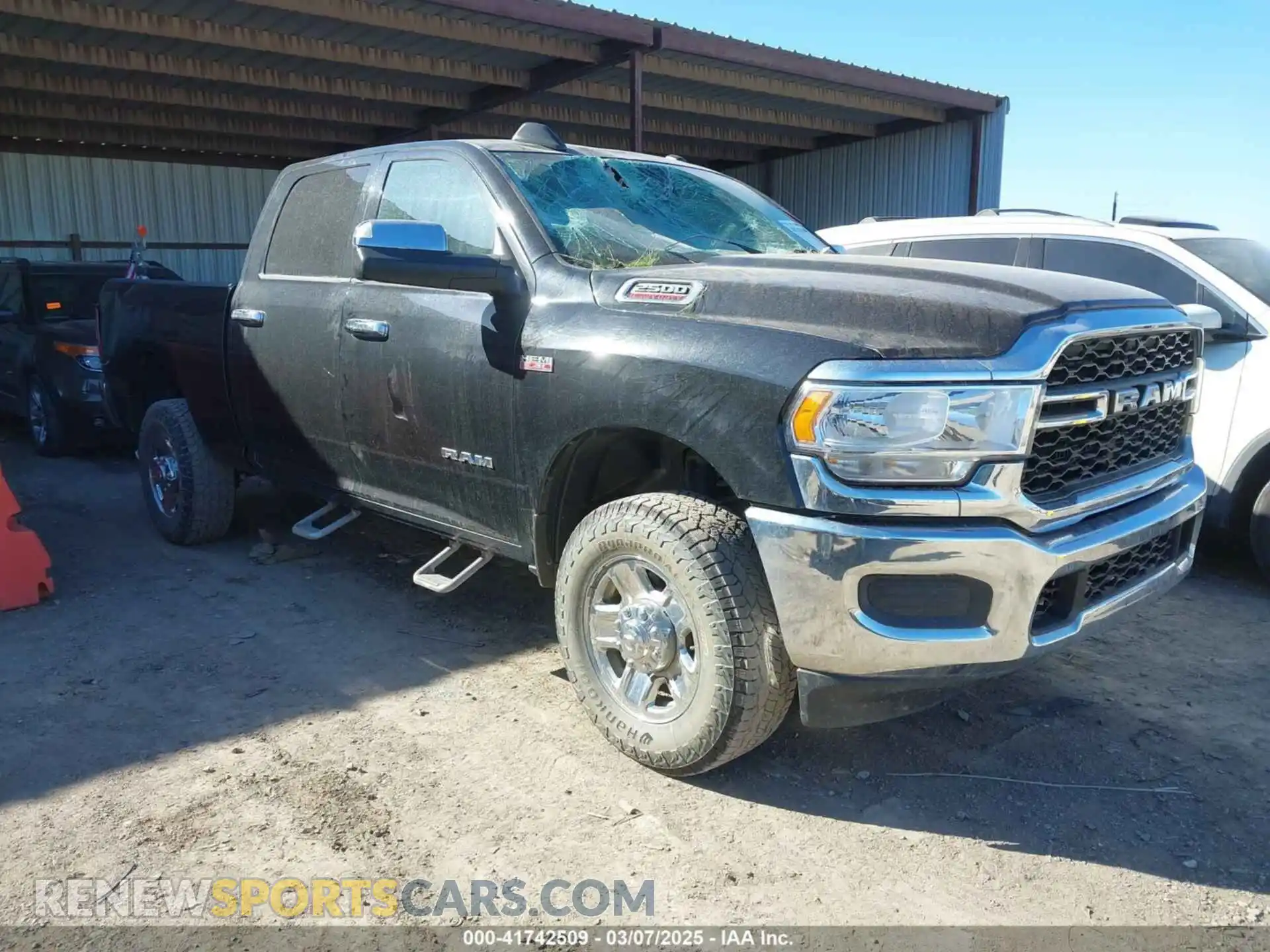 1 Photograph of a damaged car 3C6UR5CJ2MG573337 RAM 2500 2021