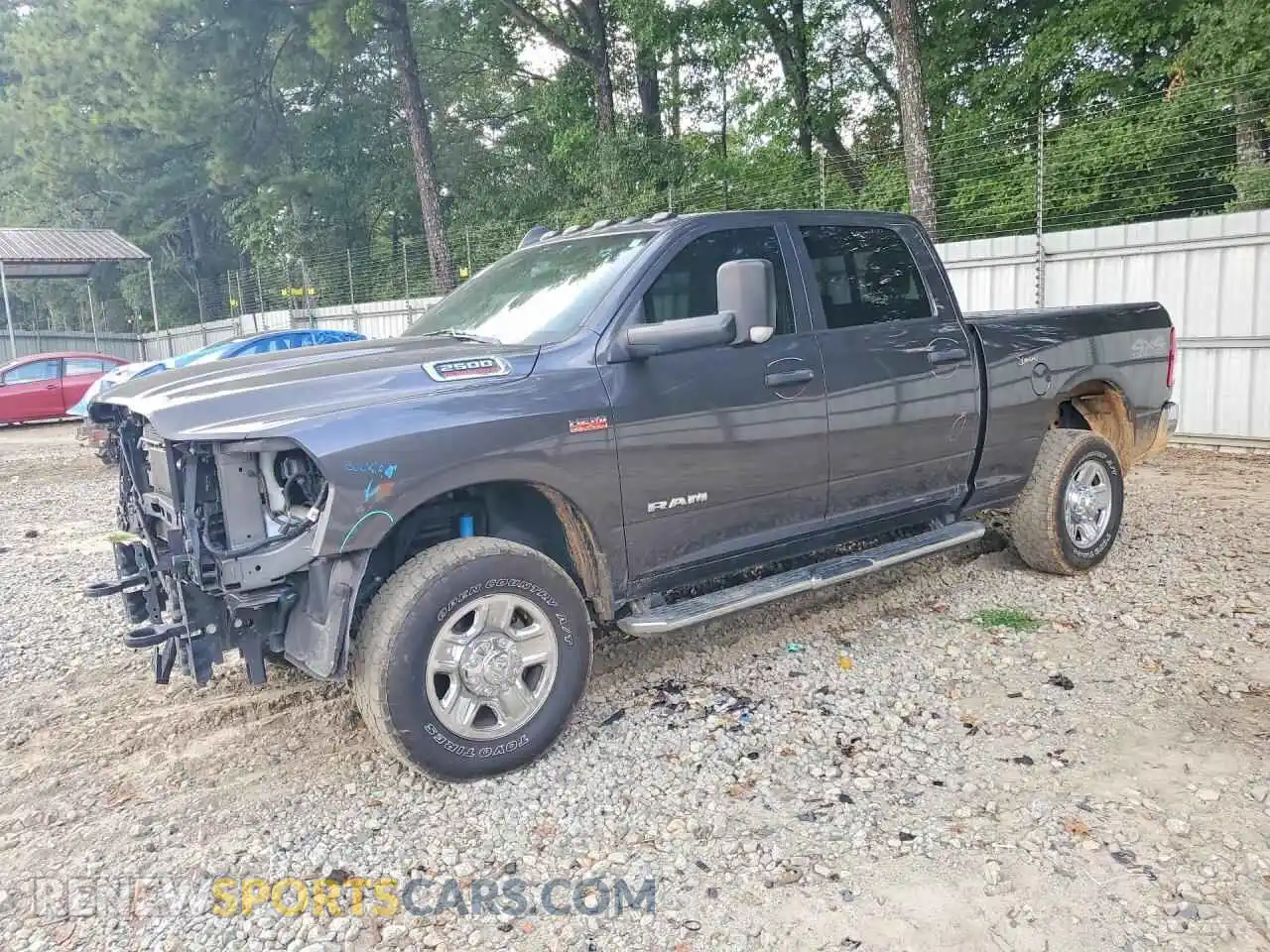 1 Photograph of a damaged car 3C6UR5CJ5MG660570 RAM 2500 2021