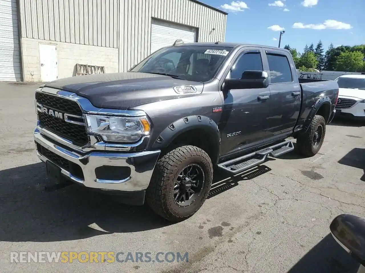 1 Photograph of a damaged car 3C6UR5CJ6MG516557 RAM 2500 2021