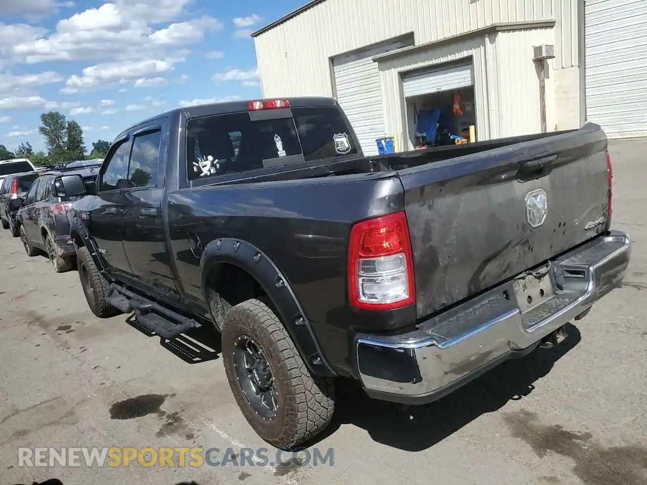 2 Photograph of a damaged car 3C6UR5CJ6MG516557 RAM 2500 2021