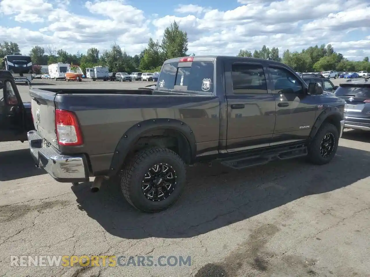 3 Photograph of a damaged car 3C6UR5CJ6MG516557 RAM 2500 2021