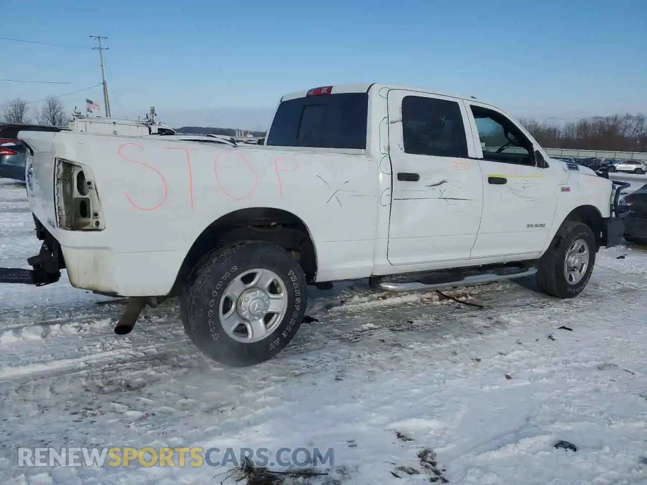 3 Photograph of a damaged car 3C6UR5CJ6MG598922 RAM 2500 2021