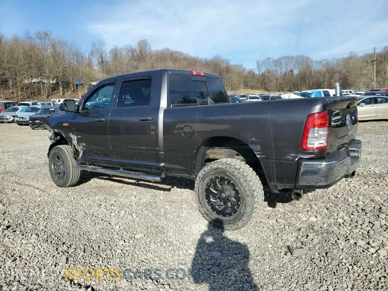 2 Photograph of a damaged car 3C6UR5CJ6MG659413 RAM 2500 2021