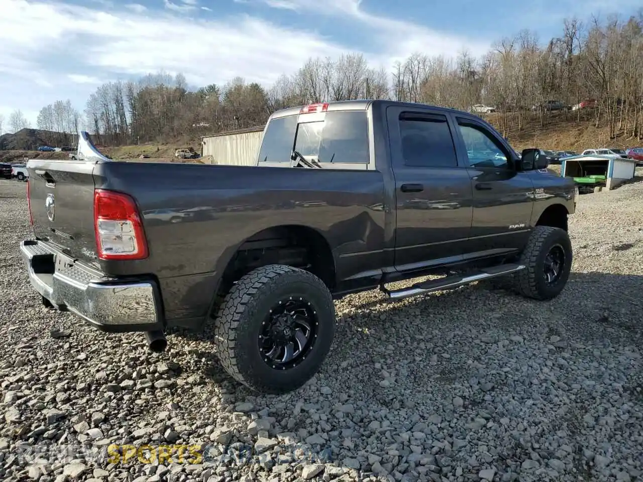 3 Photograph of a damaged car 3C6UR5CJ6MG659413 RAM 2500 2021