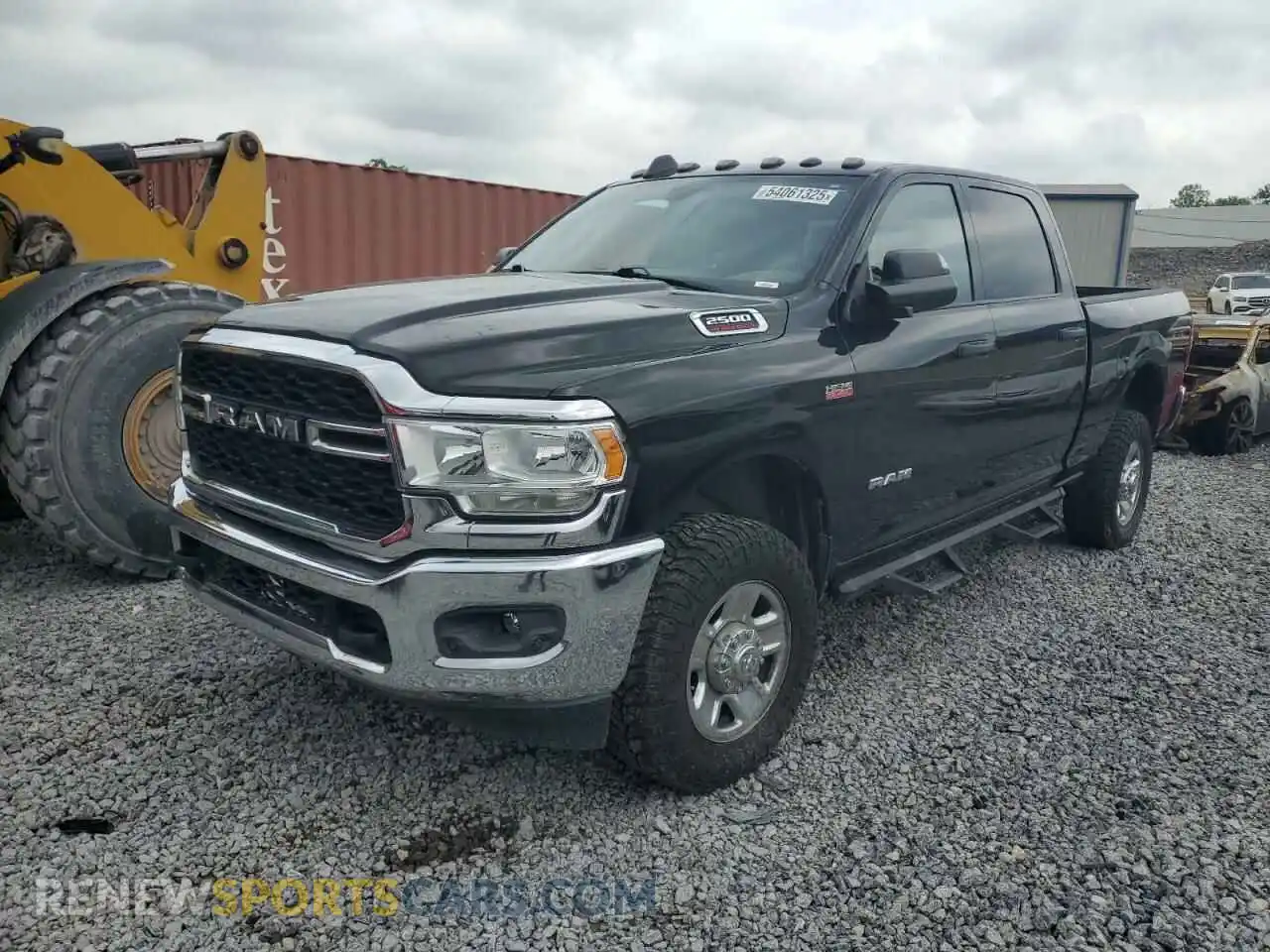 1 Photograph of a damaged car 3C6UR5CJ6MG695991 RAM 2500 2021