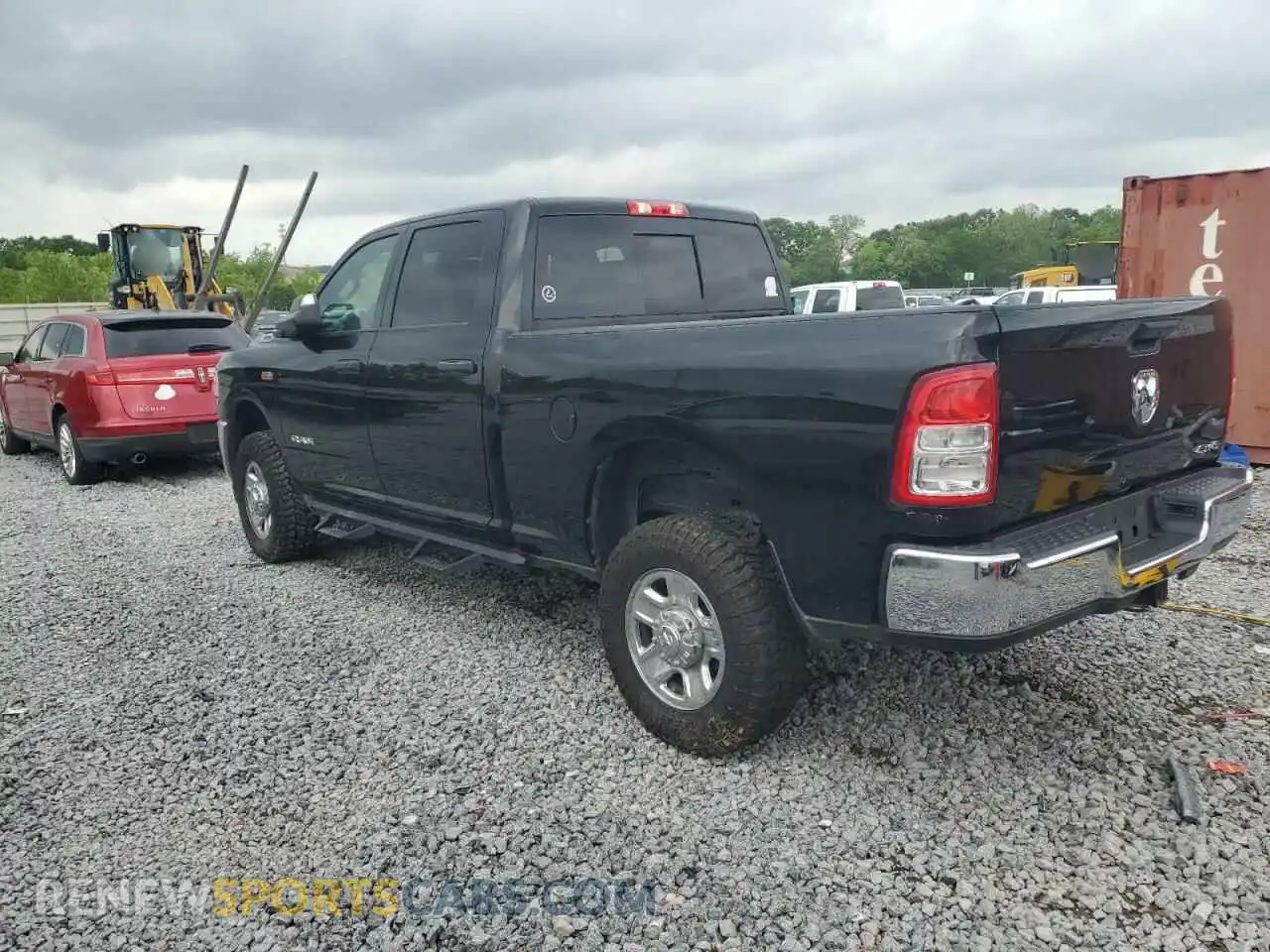 2 Photograph of a damaged car 3C6UR5CJ6MG695991 RAM 2500 2021