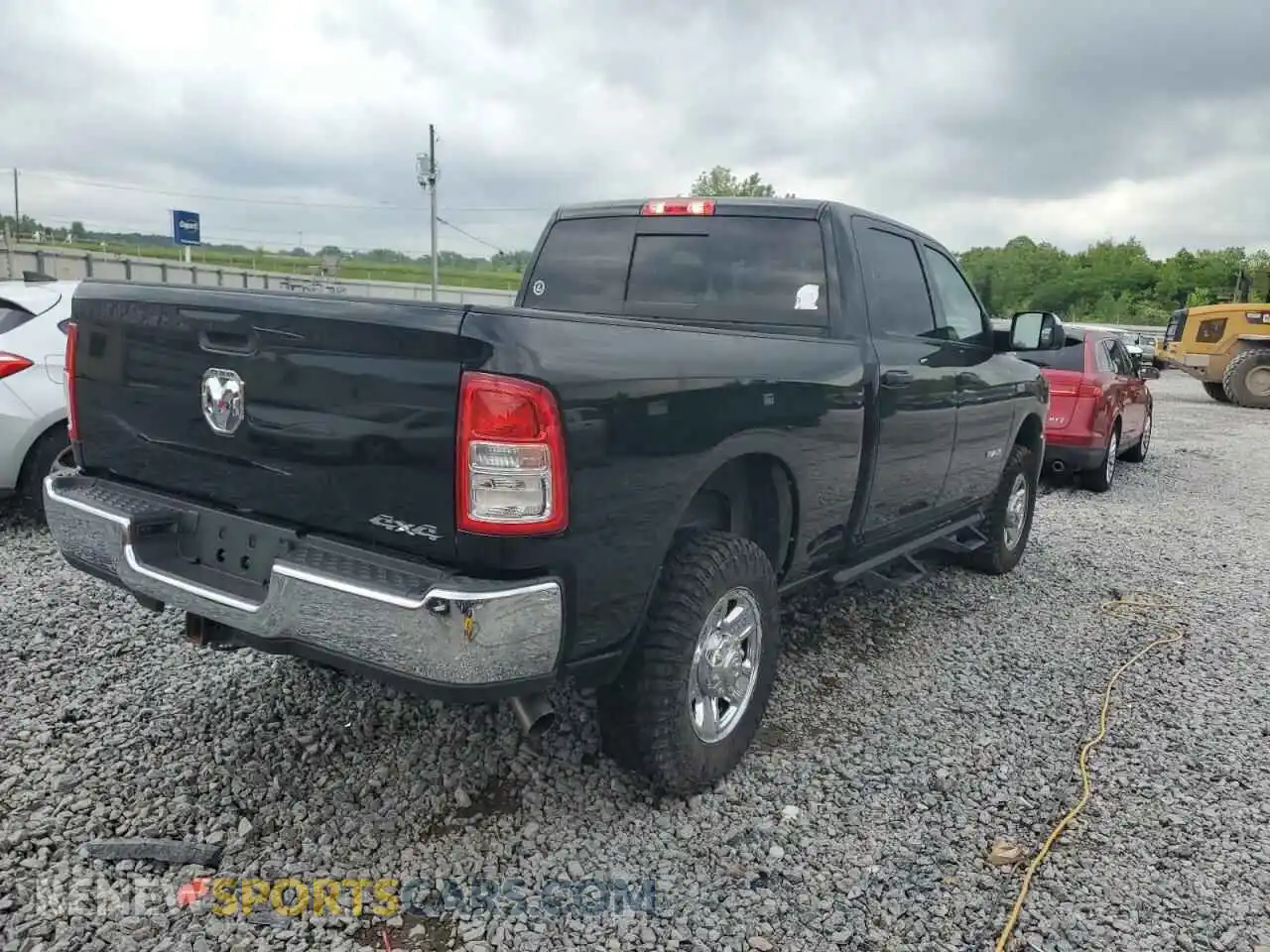 3 Photograph of a damaged car 3C6UR5CJ6MG695991 RAM 2500 2021