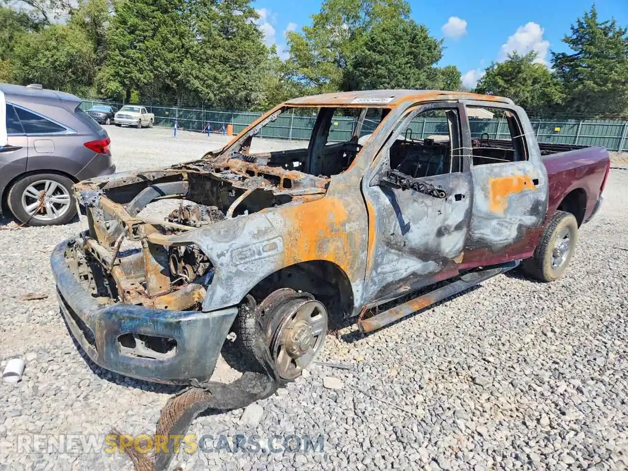 1 Photograph of a damaged car 3C6UR5CJ7MG560714 RAM 2500 2021