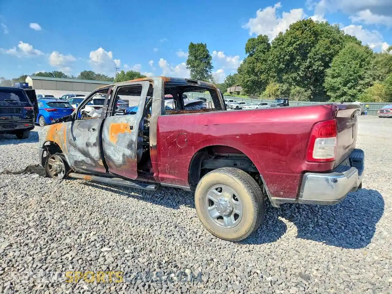 2 Photograph of a damaged car 3C6UR5CJ7MG560714 RAM 2500 2021