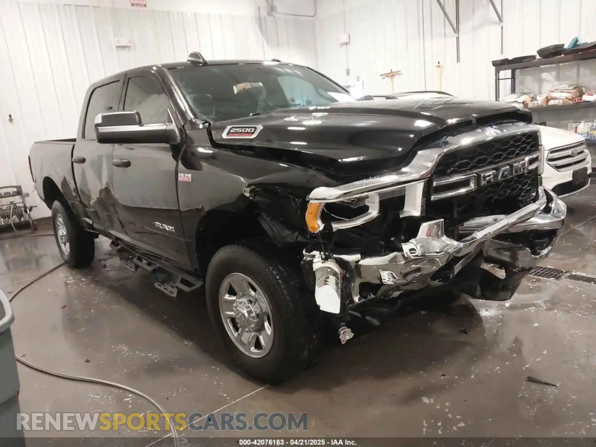 1 Photograph of a damaged car 3C6UR5CJ7MG657251 RAM 2500 2021
