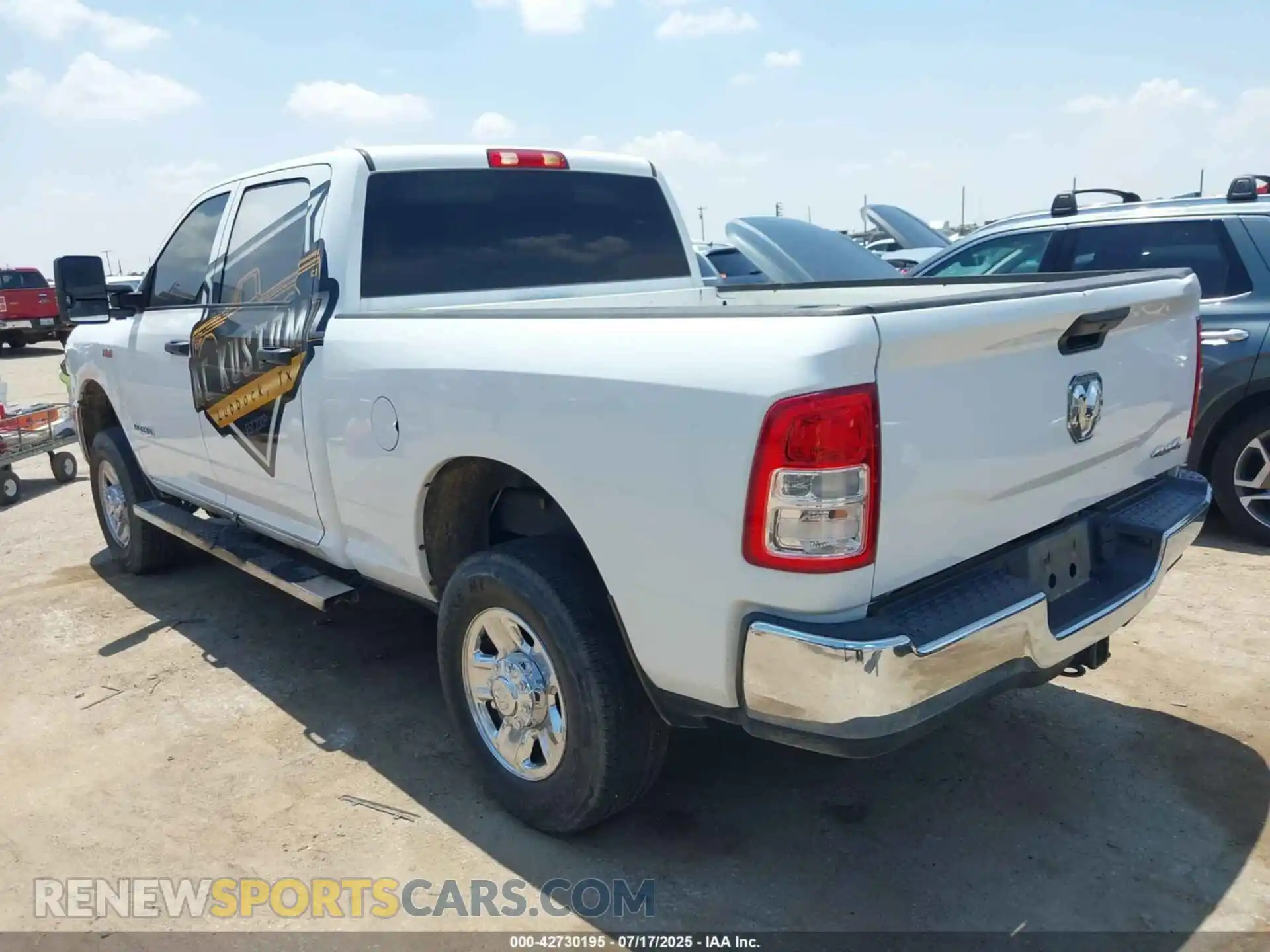3 Photograph of a damaged car 3C6UR5CJ7MG682781 RAM 2500 2021