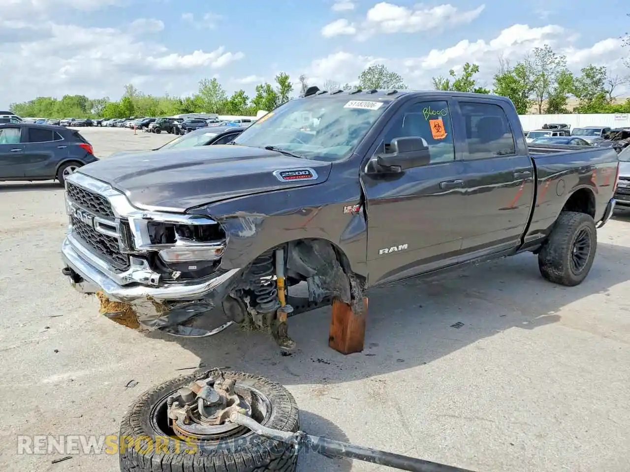 1 Photograph of a damaged car 3C6UR5CJ8MG696916 RAM 2500 2021