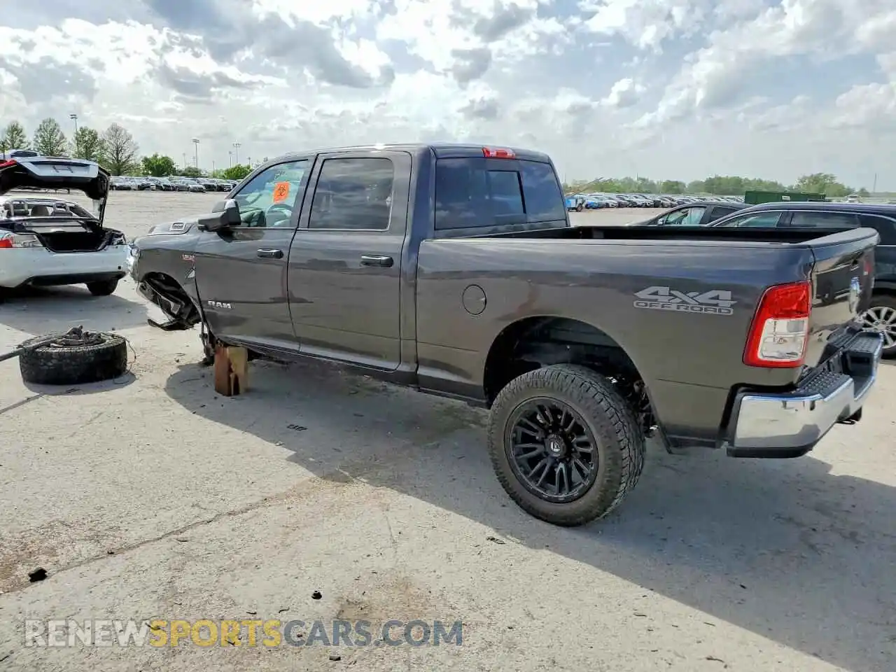 2 Photograph of a damaged car 3C6UR5CJ8MG696916 RAM 2500 2021