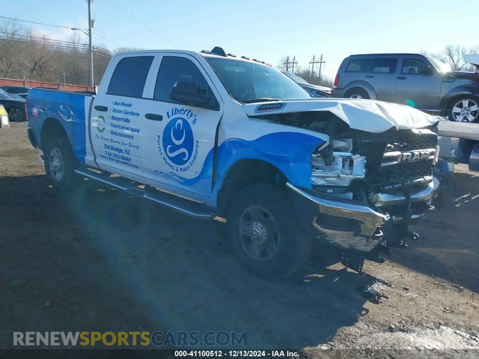 1 Photograph of a damaged car 3C6UR5CJ9MG680627 RAM 2500 2021