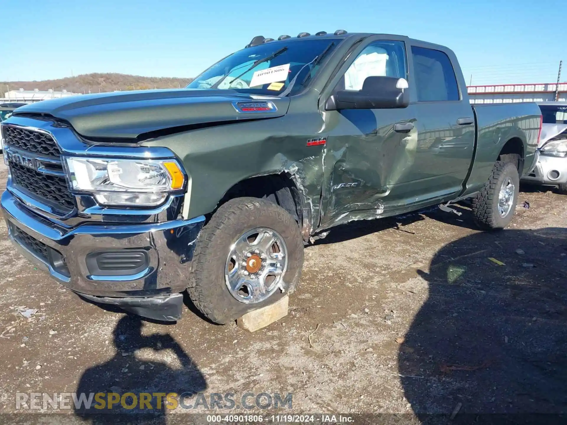 2 Photograph of a damaged car 3C6UR5CJXMG560559 RAM 2500 2021