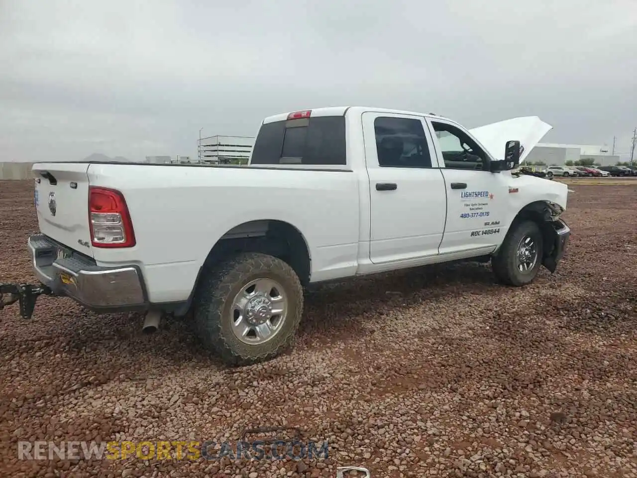 3 Photograph of a damaged car 3C6UR5CJXMG672598 RAM 2500 2021