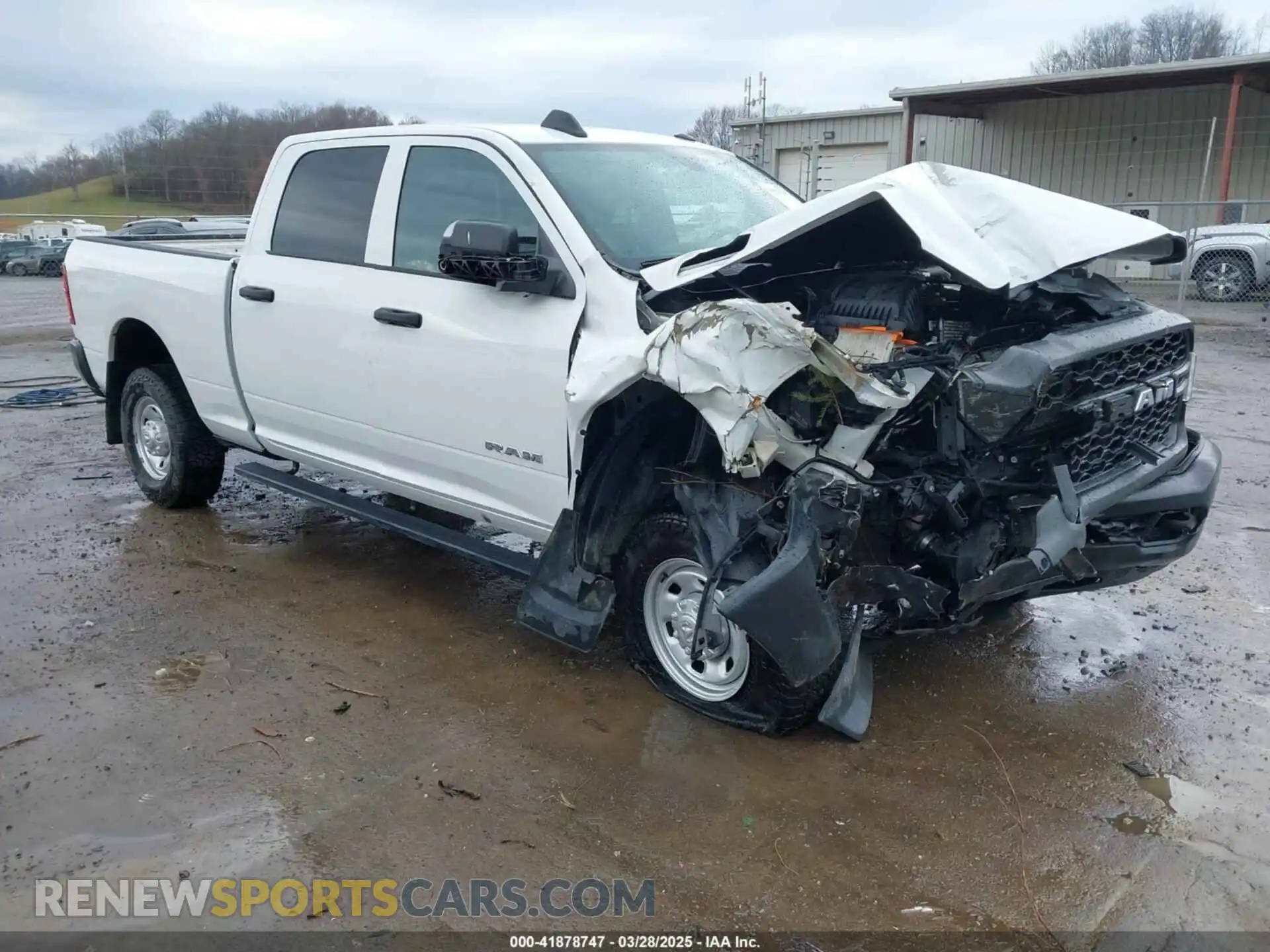 1 Photograph of a damaged car 3C6UR5CL2MG669244 RAM 2500 2021