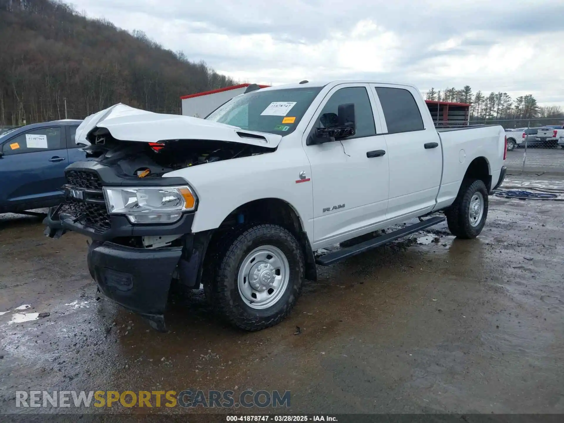 2 Photograph of a damaged car 3C6UR5CL2MG669244 RAM 2500 2021