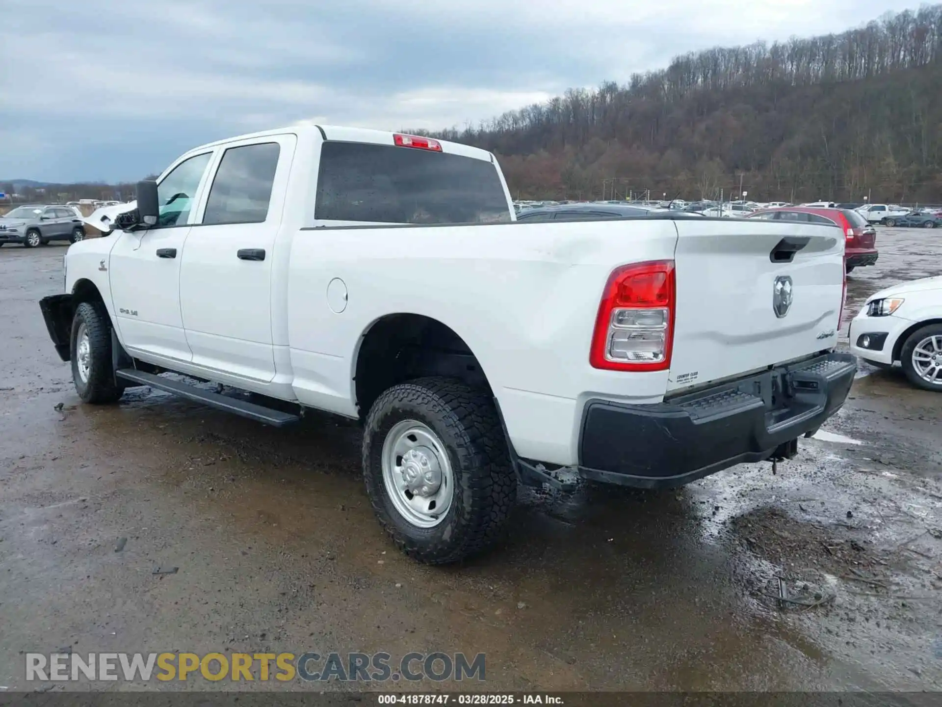 3 Photograph of a damaged car 3C6UR5CL2MG669244 RAM 2500 2021
