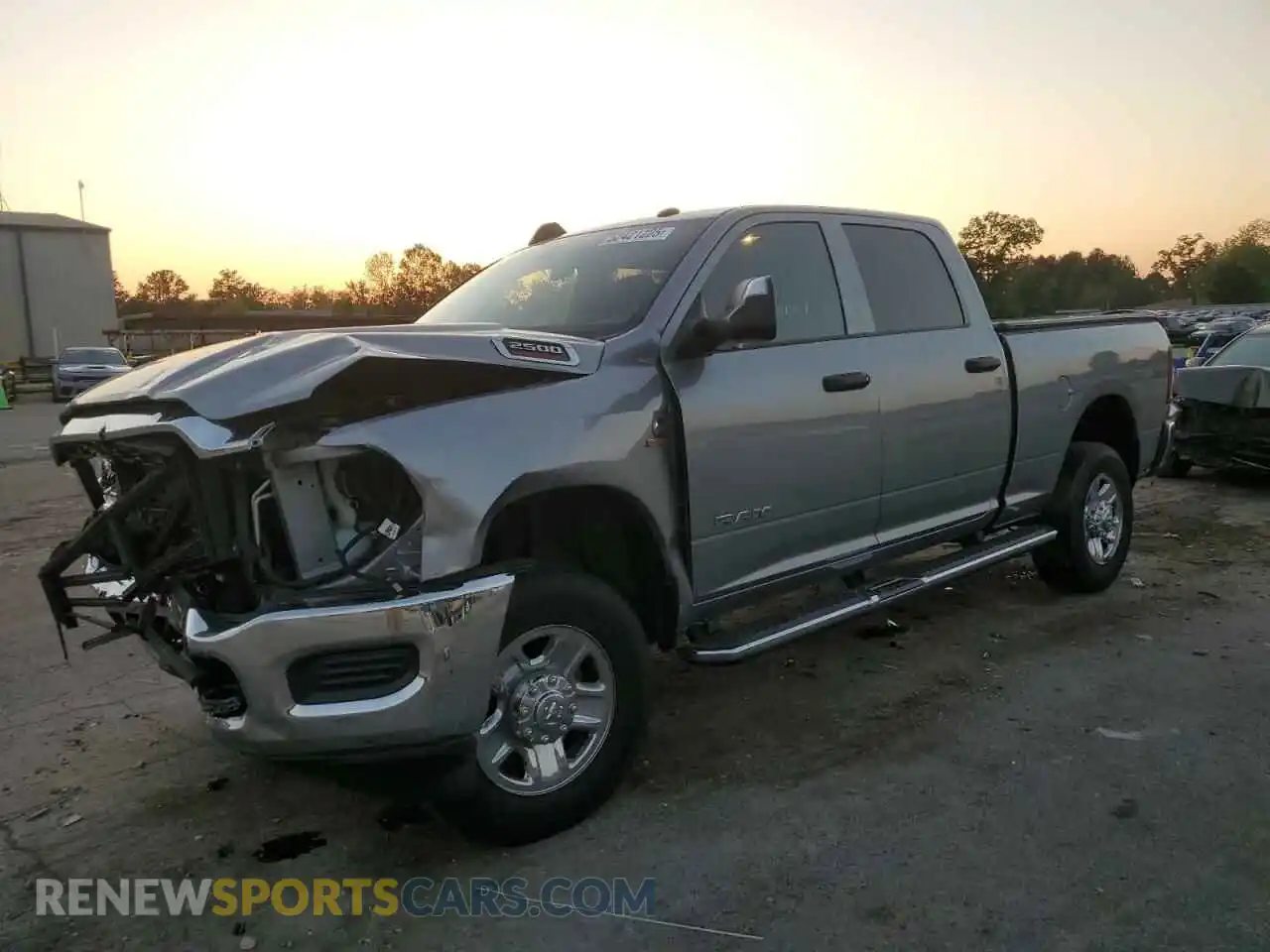 1 Photograph of a damaged car 3C6UR5CL4MG631756 RAM 2500 2021