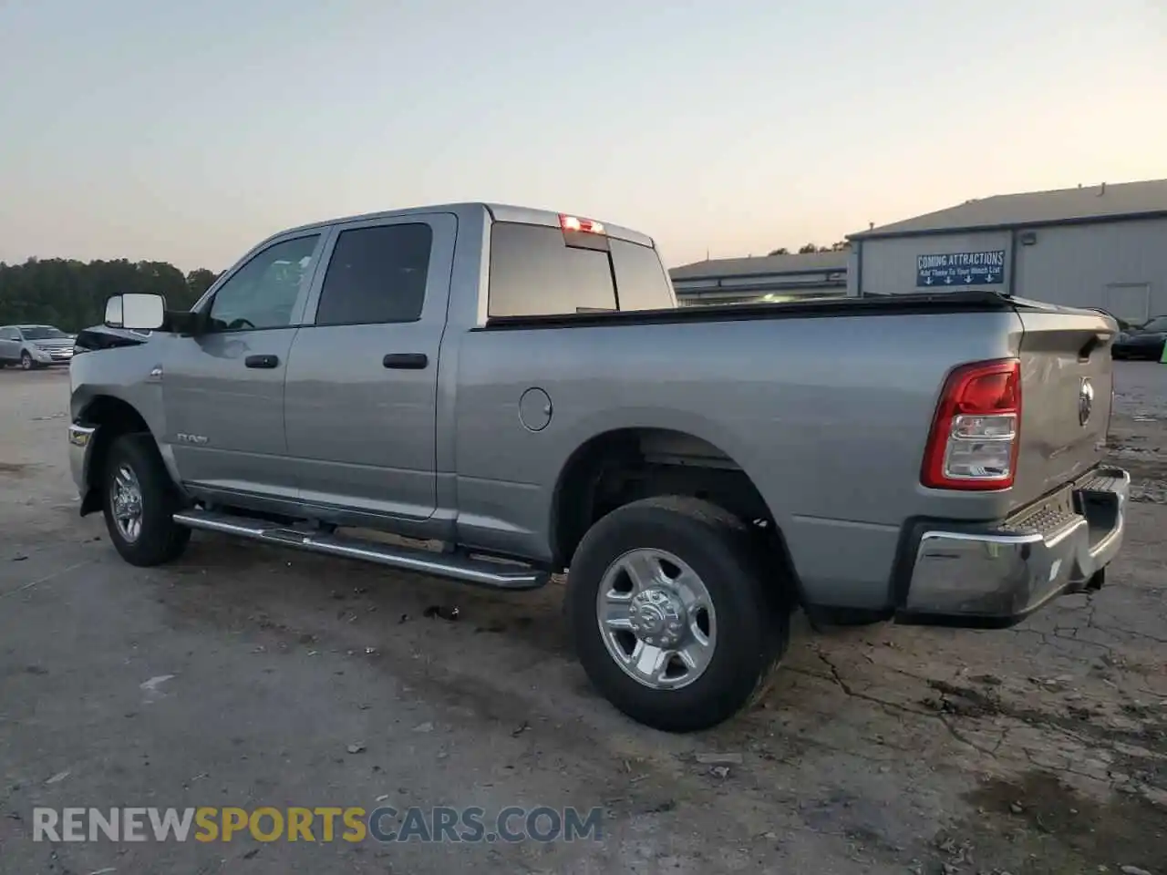 2 Photograph of a damaged car 3C6UR5CL4MG631756 RAM 2500 2021