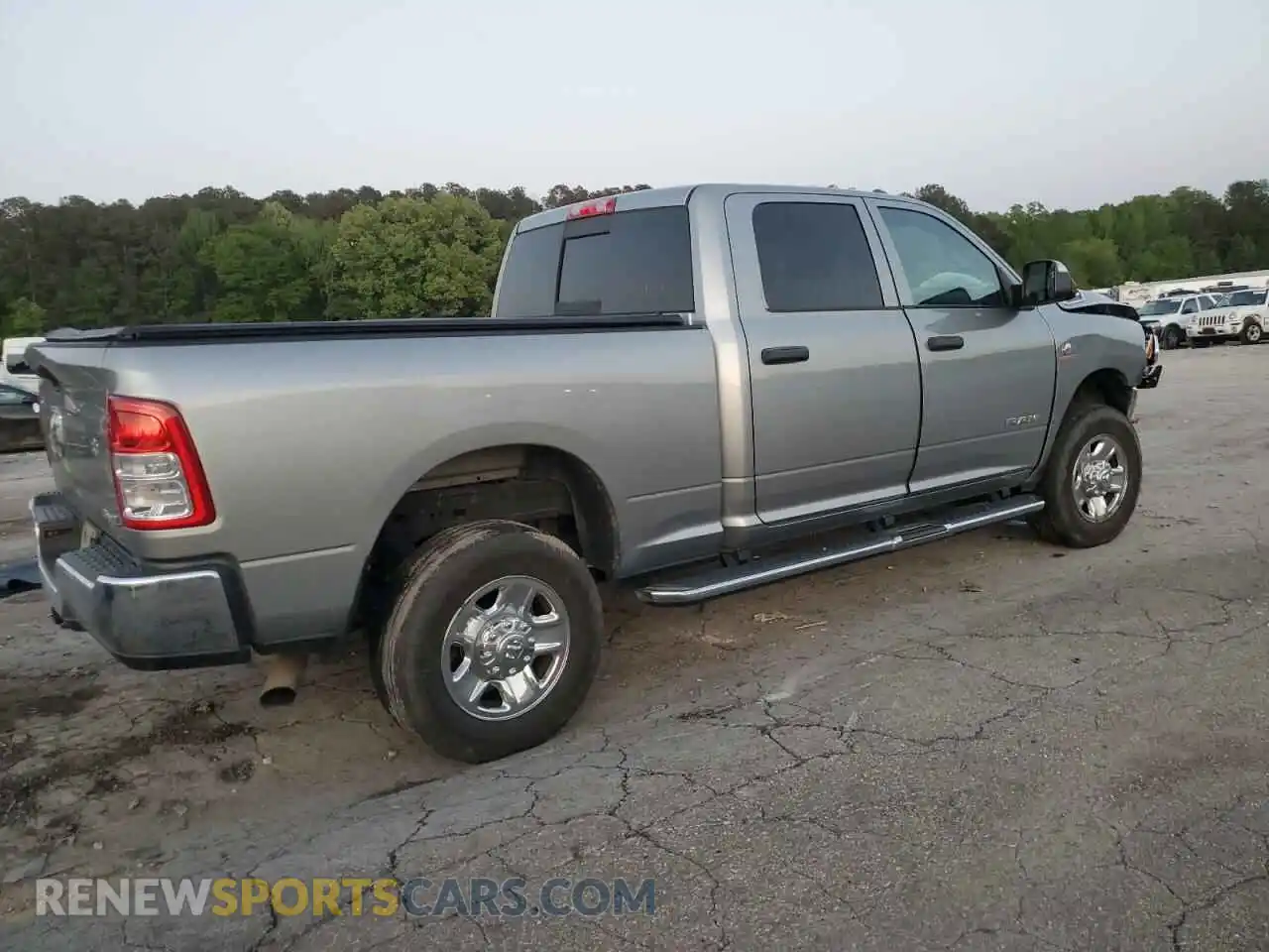 3 Photograph of a damaged car 3C6UR5CL4MG631756 RAM 2500 2021