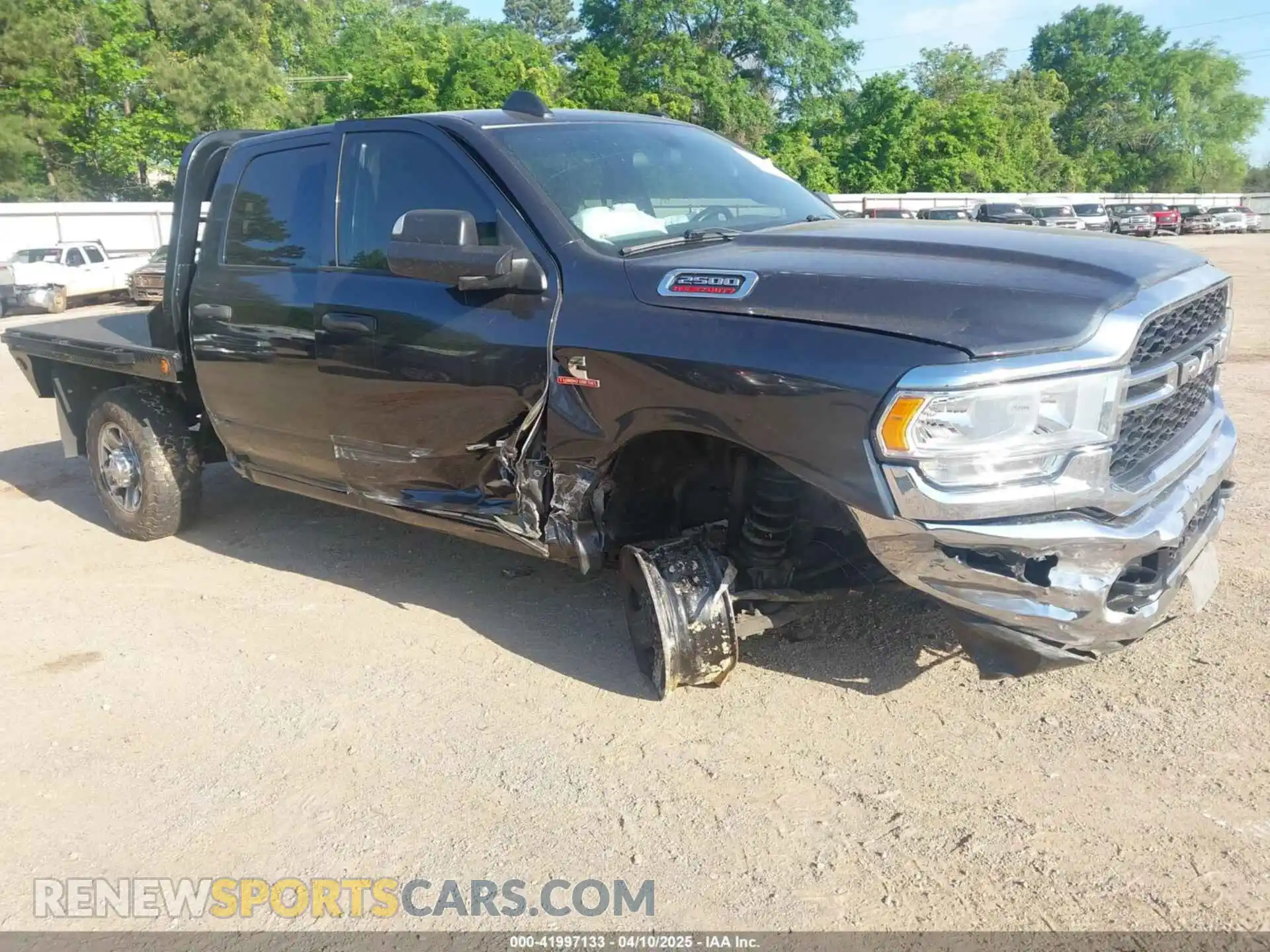 1 Photograph of a damaged car 3C6UR5CL4MG655572 RAM 2500 2021