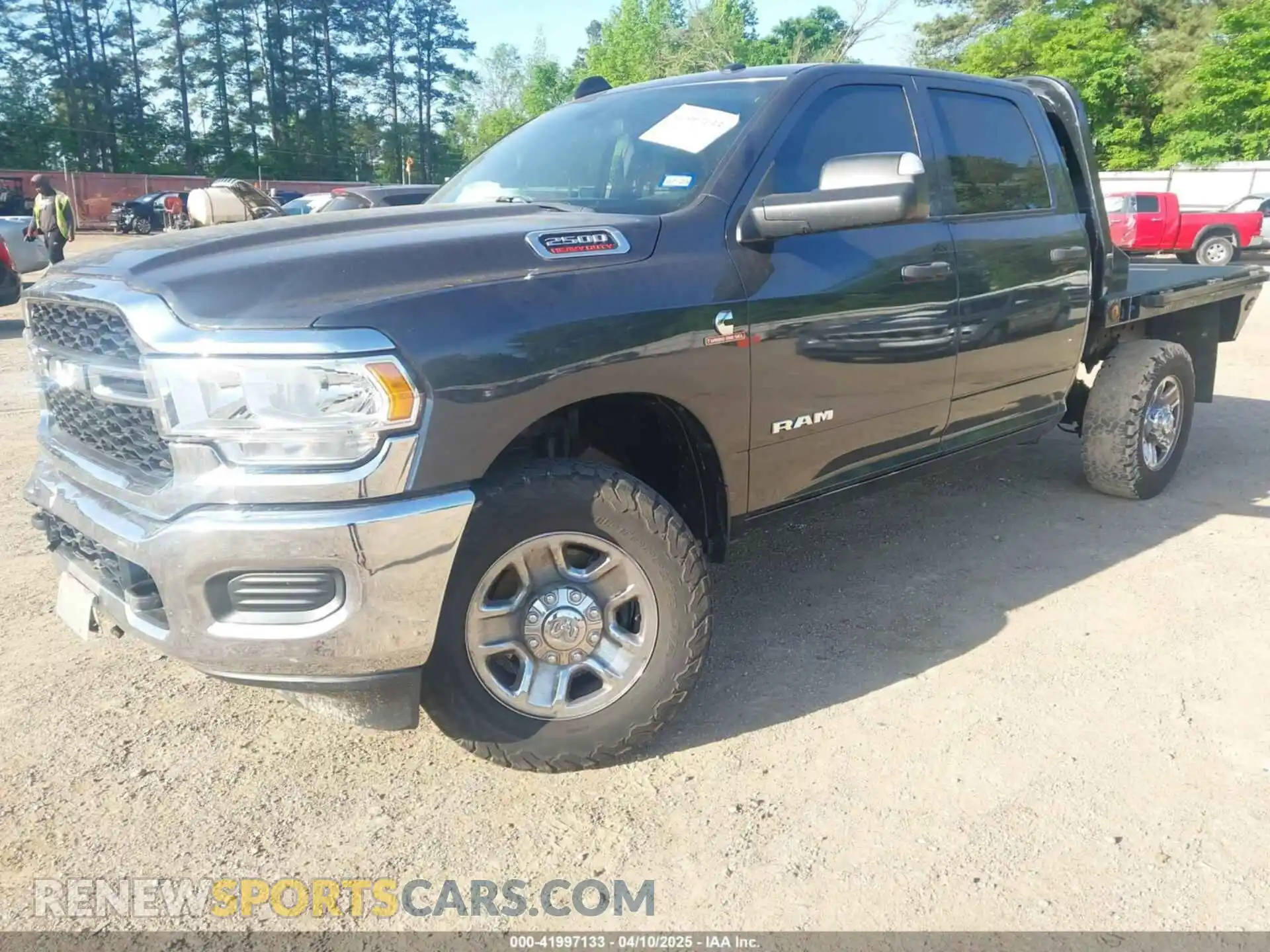 2 Photograph of a damaged car 3C6UR5CL4MG655572 RAM 2500 2021