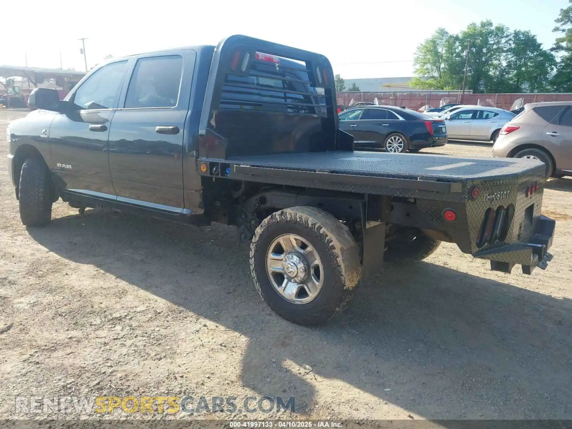 3 Photograph of a damaged car 3C6UR5CL4MG655572 RAM 2500 2021