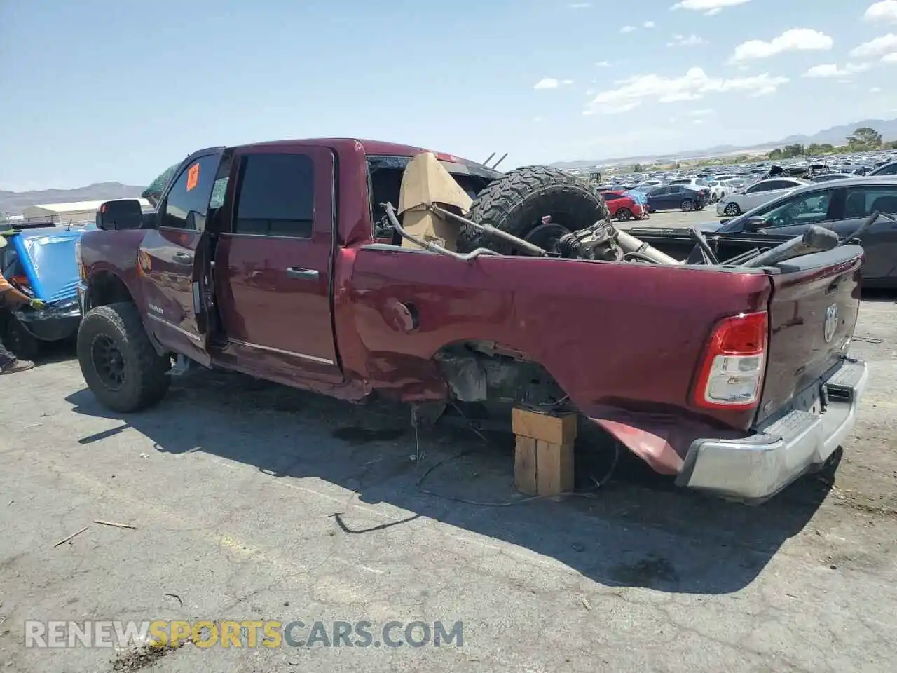 2 Photograph of a damaged car 3C6UR5CL4MG697059 RAM 2500 2021