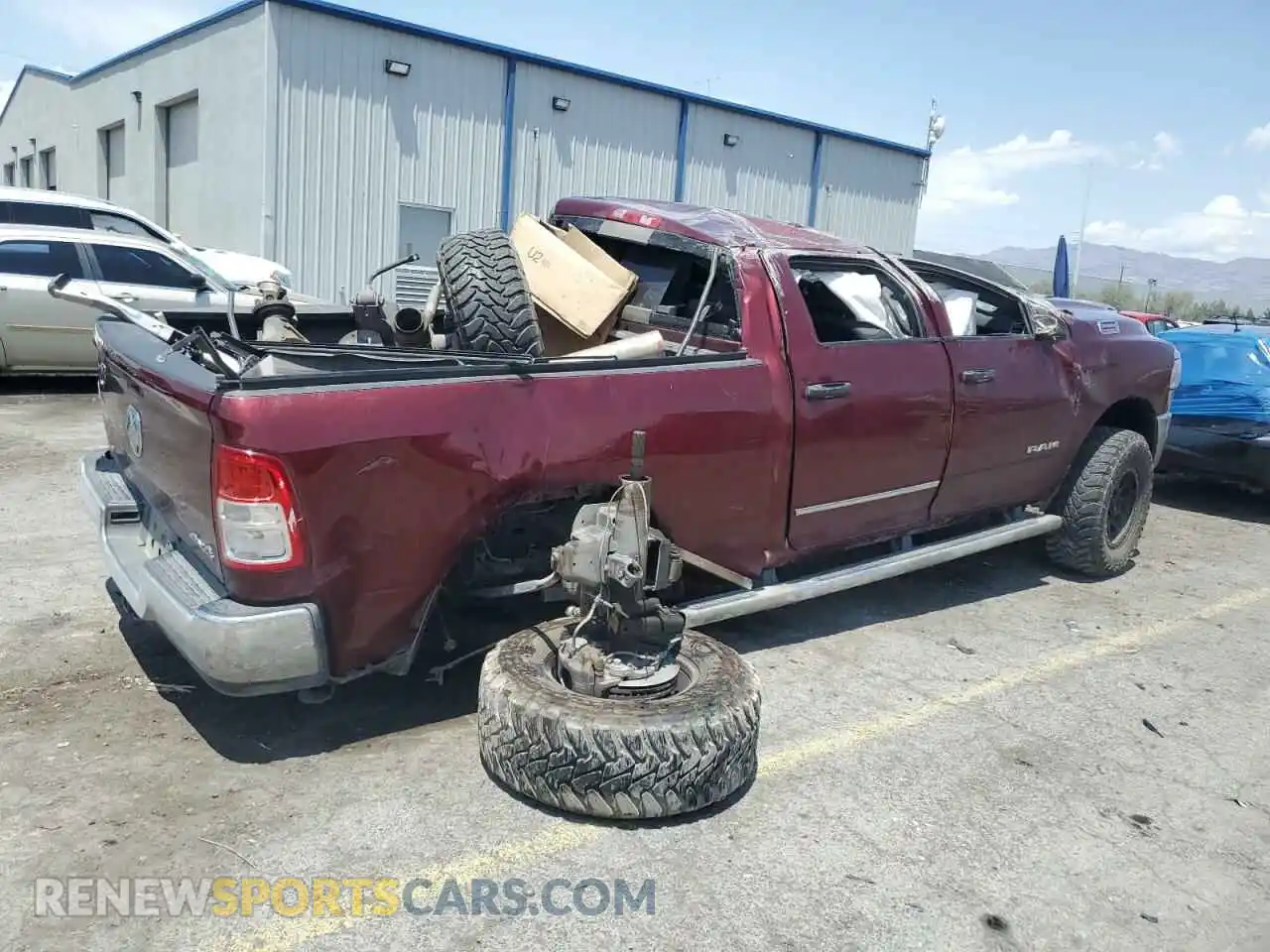 3 Photograph of a damaged car 3C6UR5CL4MG697059 RAM 2500 2021