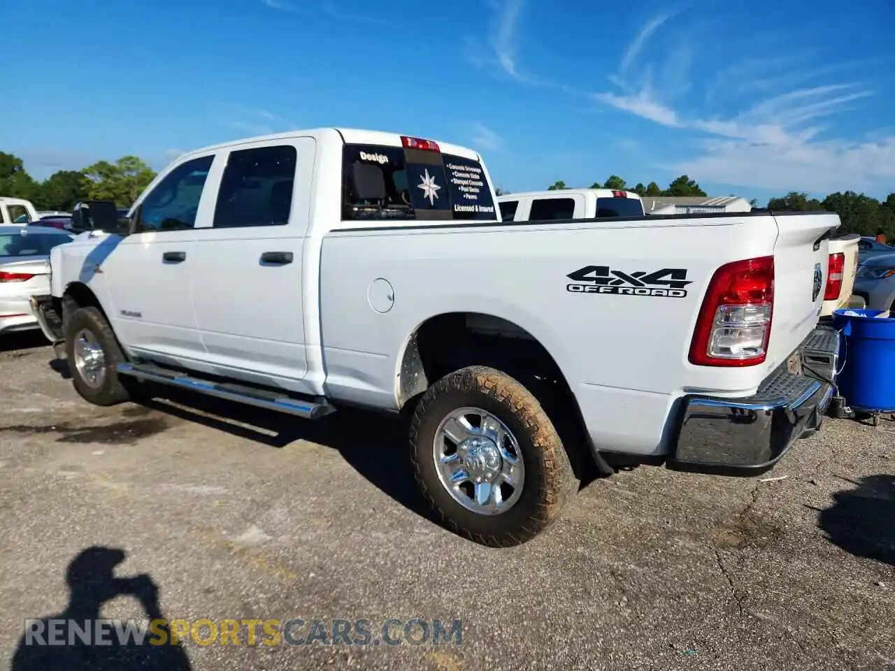 2 Photograph of a damaged car 3C6UR5CL5MG629787 RAM 2500 2021