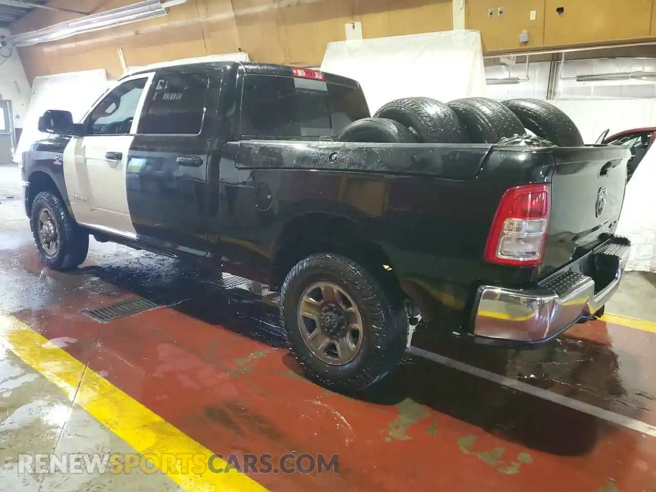 2 Photograph of a damaged car 3C6UR5CL7MG584058 RAM 2500 2021