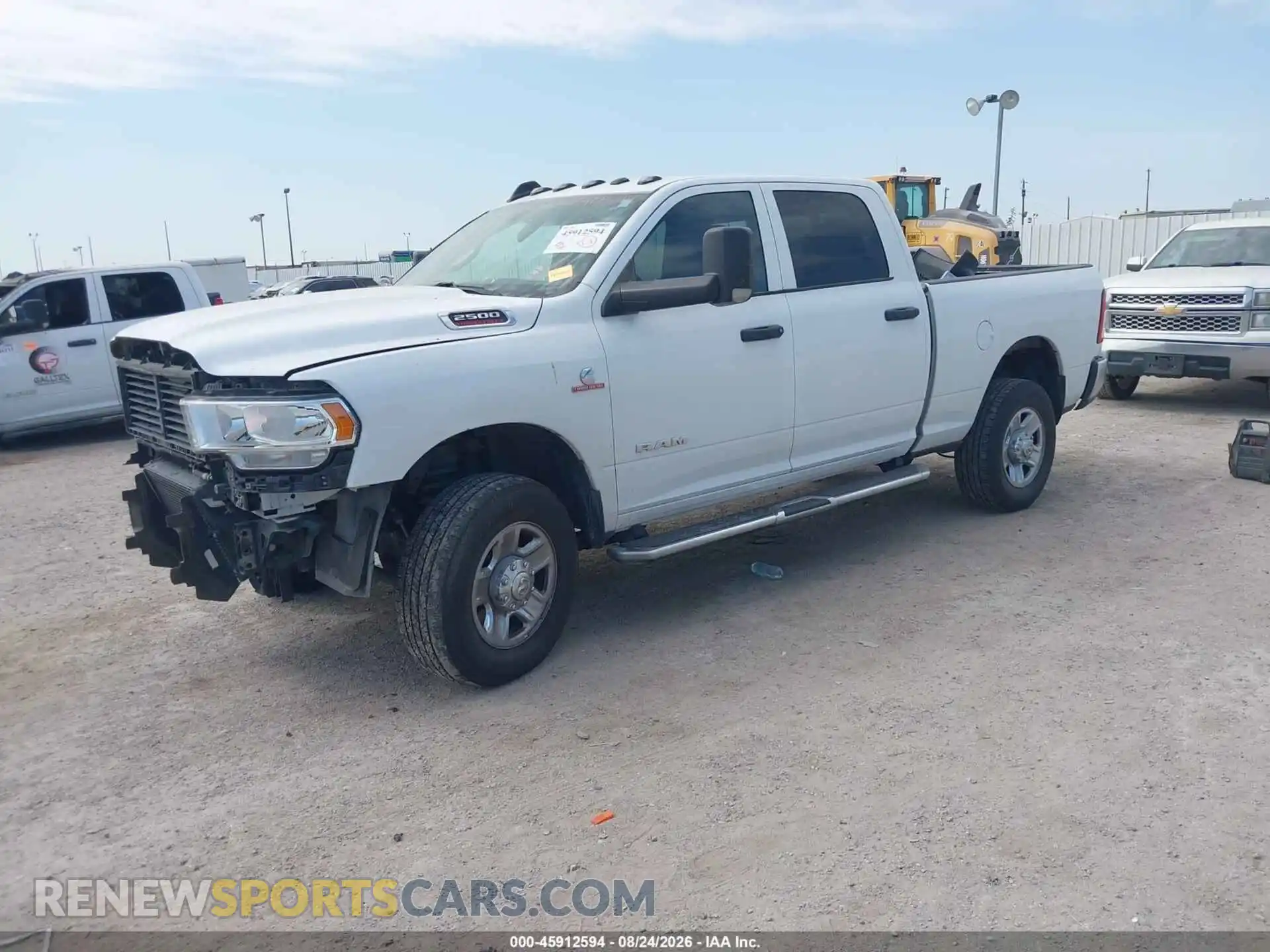 2 Photograph of a damaged car 3C6UR5CL7MG602980 RAM 2500 2021