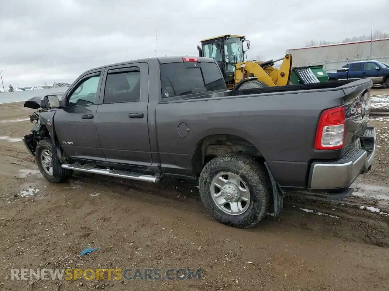 2 Photograph of a damaged car 3C6UR5CL8MG538609 RAM 2500 2021
