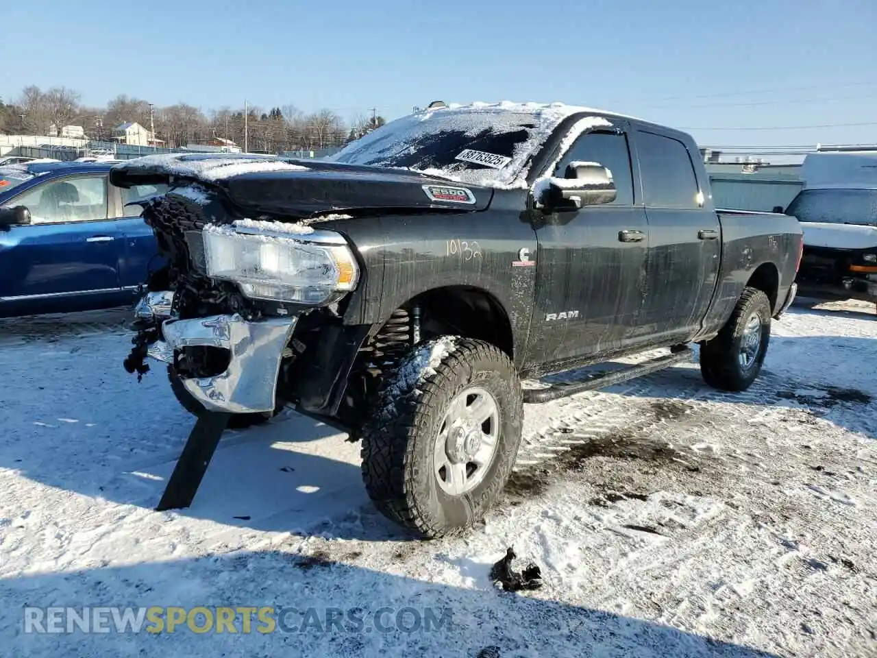 1 Photograph of a damaged car 3C6UR5CL8MG609050 RAM 2500 2021