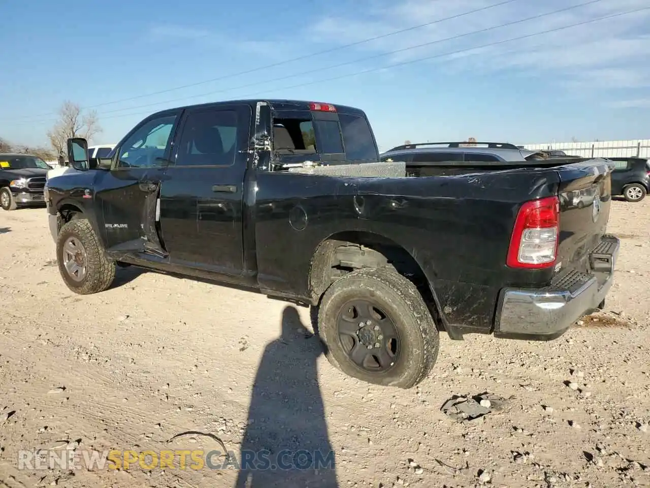 2 Photograph of a damaged car 3C6UR5CL8MG630884 RAM 2500 2021