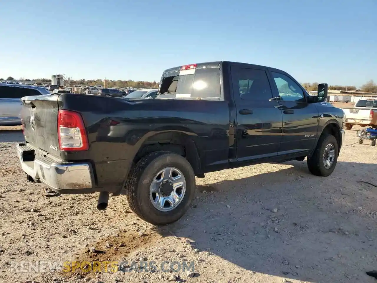 3 Photograph of a damaged car 3C6UR5CL8MG630884 RAM 2500 2021