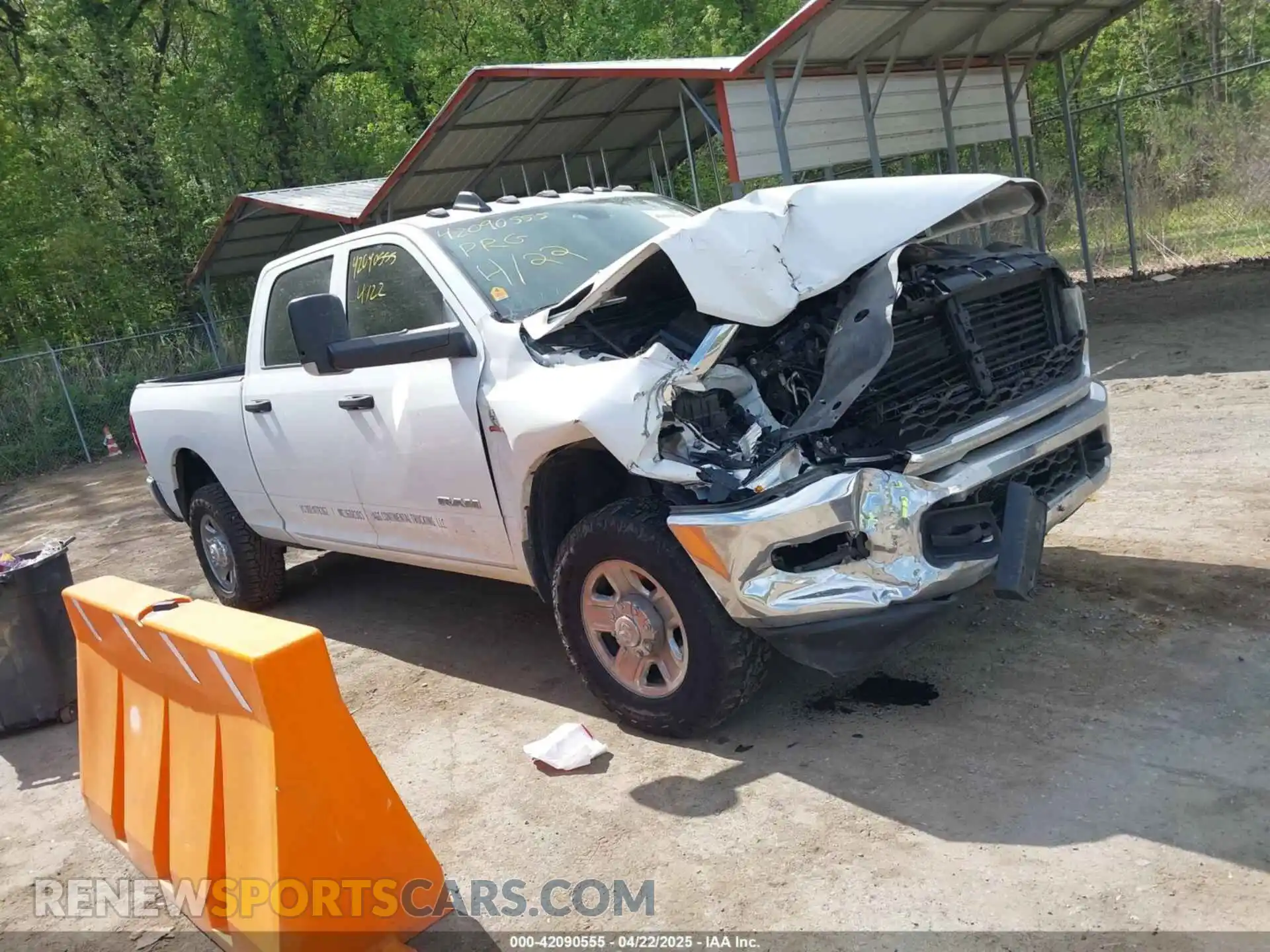 1 Photograph of a damaged car 3C6UR5CLXMG511265 RAM 2500 2021